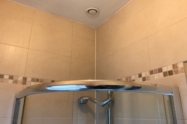 This is a similar shower with the humidity sensing extractor fan but without the extended top section.