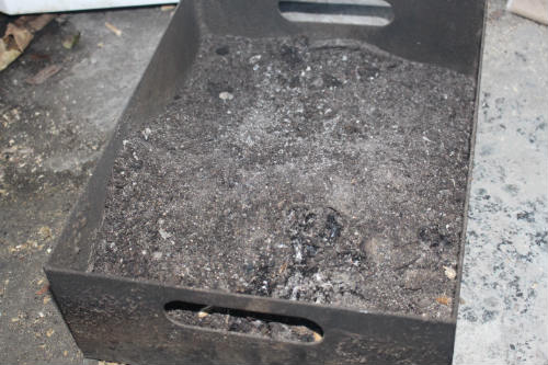 Wood pellet ash tray typically emptied once a fortnight.